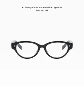 Glossy black cat-eye frame sunglasses with clear anti-blue light lenses shown in detail