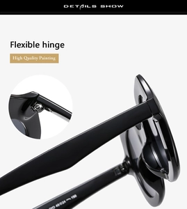 Close-up of flexible hinge and high-quality painting on vintage round frame sunglasses
