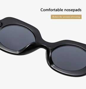Close-up of comfortable integrated nose pads on black retro polygon sunglasses