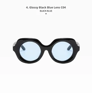 Vue détaillée de la monture noire avec verres bleus et charnières métalliques de lunettes