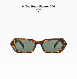 Gros plan de lunettes de soleil en écailles demi avec de larges montures et verres gris
