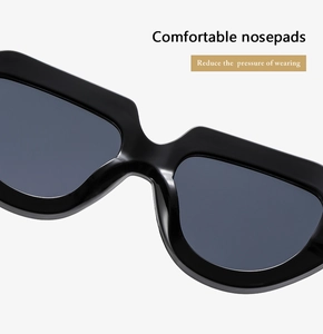 Close-up of integrated comfortable nose pads on black wide frame sunglasses