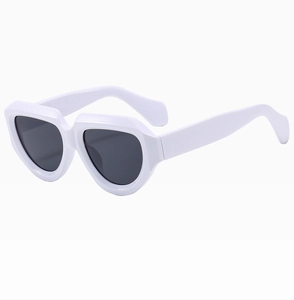 Detail of wide white sunglasses frame with oversized thick temples and black lenses