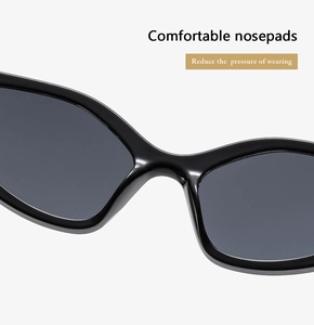 Detail of comfortable integrated nose pads on black cat-eye sunglasses for reduced pressure