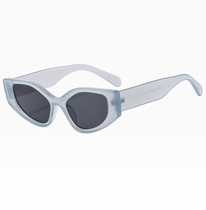 Detail view of cat eye sunglasses with light blue frame and 51-21-135 size specs