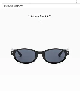 Détail de lunettes de soleil ovales rétro noires avec rivets argentés et verres gris foncé