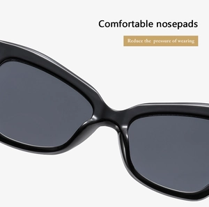 Detail of comfortable integrated nosepads on oversized black frames for reduced pressure