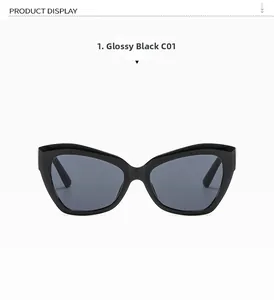 Front view of black cat eye sunglasses featuring dark lenses and wide resin frames