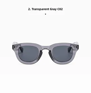 Detail view of transparent grey round frames with grey lenses for vintage style sunglasses