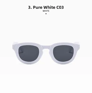 Macro detail of glossy pure white sunglasses frame with dark grey UV protective lenses