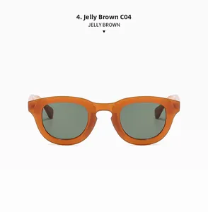 Detail view of retro round sunglasses in Jelly Brown frame C04 with dark grey-green lenses