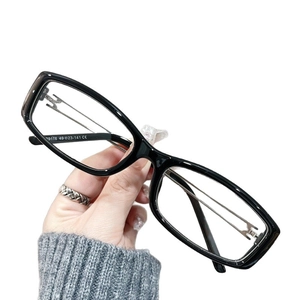 Fashionable square TR90 anti-blue light glasses with black full frame and hollow metal detail