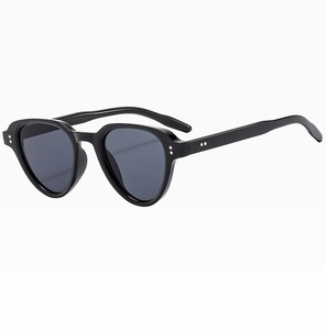 Close-up of retro black square sunglasses featuring metallic double dot rivet details