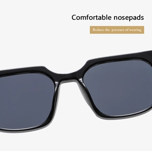 Dettaglio dei naselli integrati confortevoli su occhiali da sole neri vintage