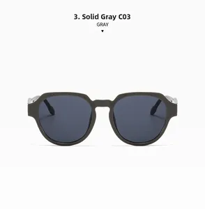 Detail view of solid grey oversized square sunglasses frame with metallic hinge accents