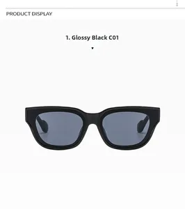 Detail of glossy black square sunglasses frame with dark grey lenses and metal hinges