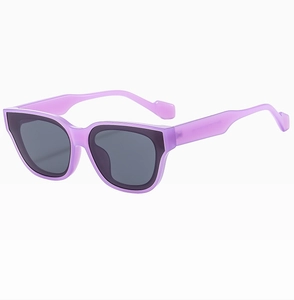 Detail of purple translucent square sunglasses frame with dark anti-UV lenses