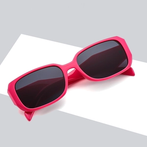 Retro rectangle sunglasses with pink thick frames and dark lenses for men and women