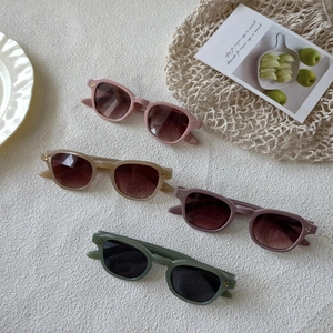 Retro small frame sunglasses in multiple colors with UV protection and metal accents