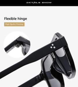Detailed view of flexible hinges and silver triple rivets on black square sunglasses