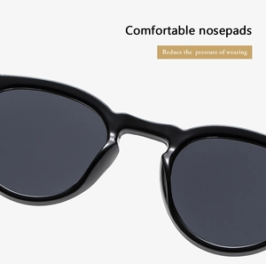 Detail of comfortable integrated nose pads on black sunglasses to reduce wearing pressure