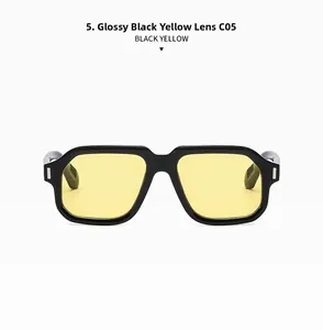Detail of square black frame sunglasses featuring translucent yellow lenses and rivets