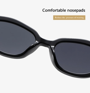 Close-up of comfortable integrated nose pads on black cat-eye sunglasses for pressure relief