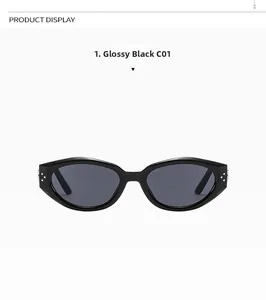 Detail of oval black sunglasses featuring silver metal rivets on the temples