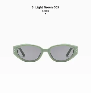 Detailed view of light green oval sunglasses with three metal rivets on the temples