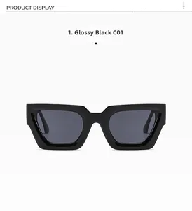 Detail view of bold black thick frame sunglasses with dark lenses and retro square design