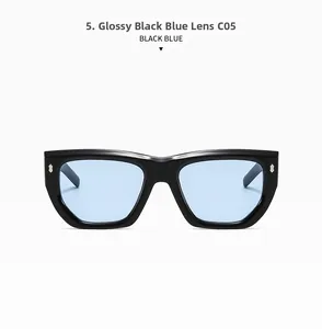 Front view of large polygon sunglasses with bright black frames and light blue lenses