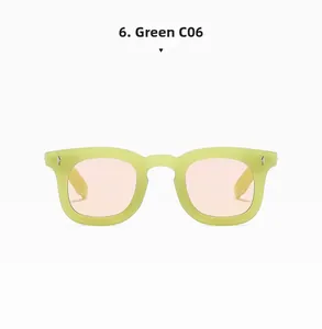Detail view of lime green matte frame sunglasses with pink lenses and silver rivets