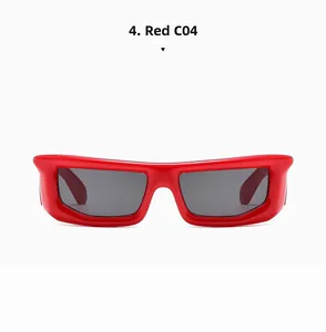 Macro shot of stylish bright red rectangular sunglasses frame with dark grey lenses