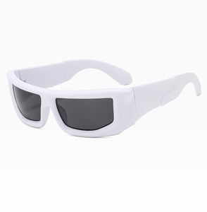 Detailed macro view of Y2K futuristic white frame sunglasses with sleek side relief detail