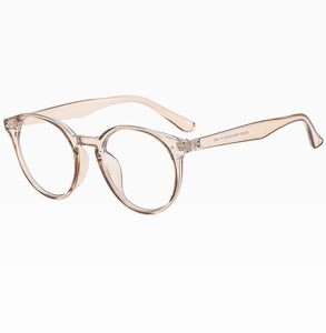 Detailansicht der transparenten champagnerfarbenen Rundbrille mit silbernen Scharnieren