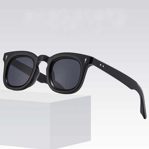 Luxury oversized black square sunglasses with silver arrow detail and gray lenses