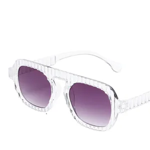 Oversized water ripple frame sunglasses with purple gradient lenses and clear temples