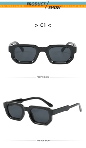 Detail view of bold black square frame sunglasses with dark grey lenses in dual angles