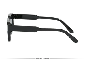 Detail view of glossy black square frame sunglasses showing durable hinge and temple design