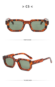 Detailed view of vintage leopard print rectangular sunglasses with dark green lenses