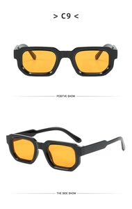 Detail view of rectangular black frames with bright orange lenses in model C9 design