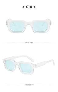 Macro detail of vintage square transparent frames with light blue lenses and hinges