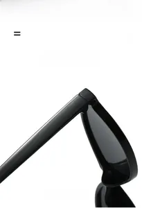 Detail view of lightweight black resin sunglasses frame with high elastic comfort hinges