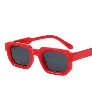 Classic red square frame sunglasses with dark lenses and glossy finish on white background