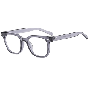 Minimalist translucent grey rectangular polarized sunglasses with silver rivets at 45 degree