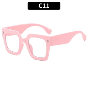 Fashionable pink oversized square frame glasses with clear lenses and silver stud detail