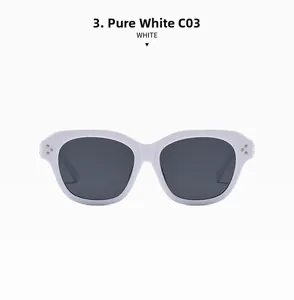 Detail view of solid white oversized sunglasses frame with silver triple rivets and dark lenses