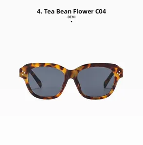 Detail of tortoise shell sunglasses featuring classic three-point metal rivet accents