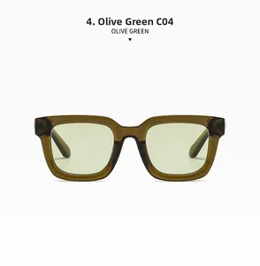Detail view of square olive green sunglasses with translucent frames and metal hinges