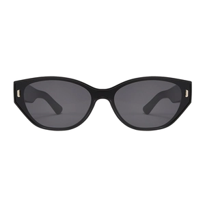 Vintage cat eye sunglasses in glossy black frame with elegant gold metal accents